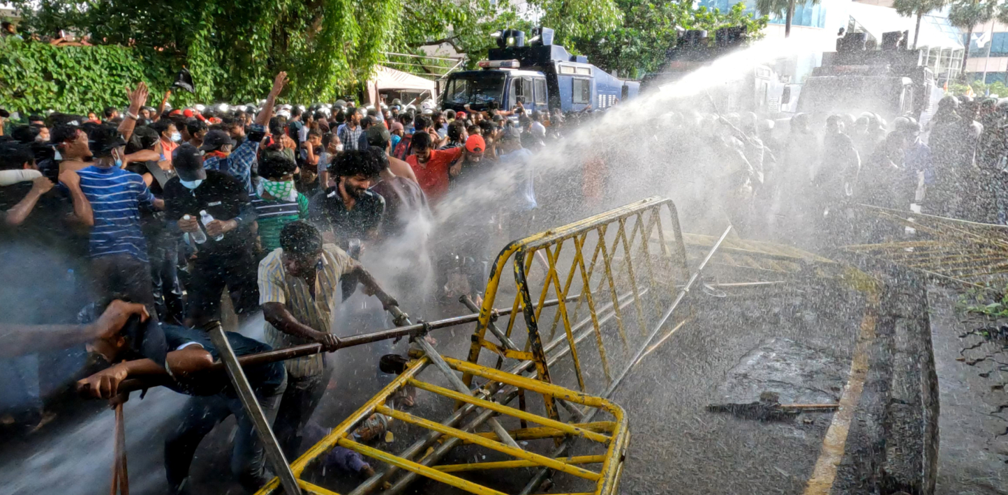 Protesters in Sri Lanka clash with police using water cannons.