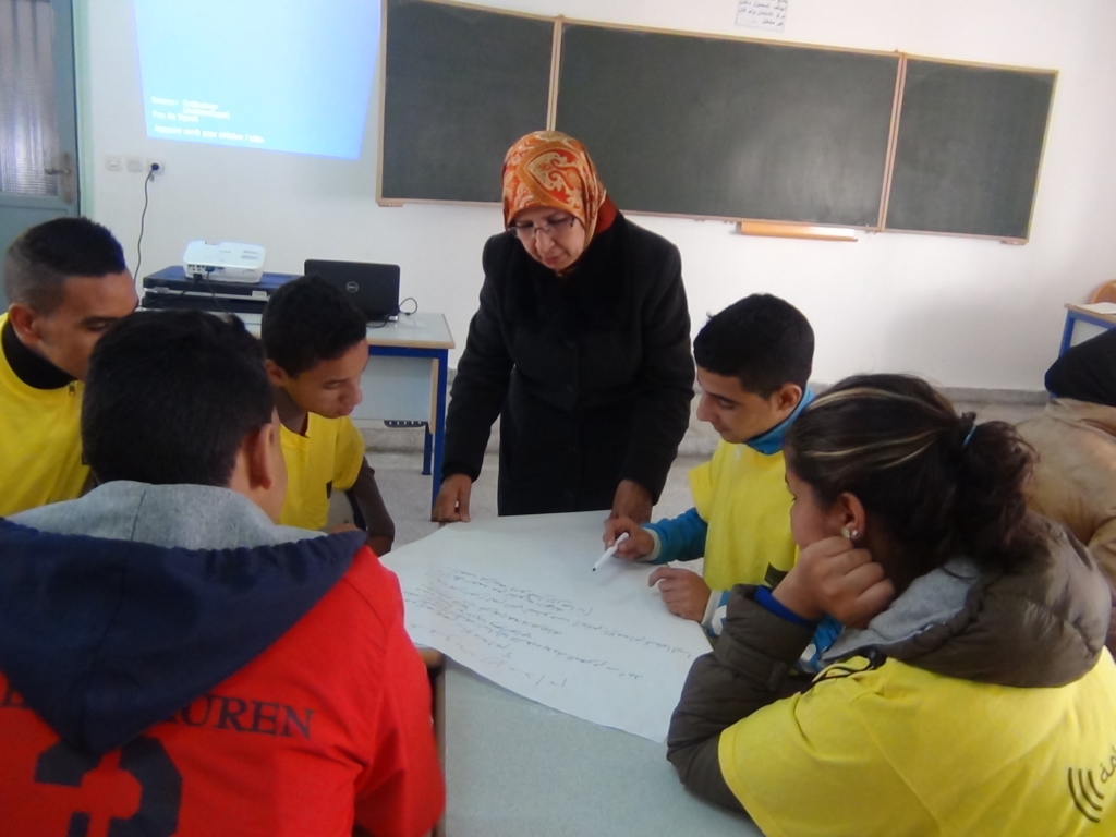 Amina Azatraoui teaching students from the Abderrahmane ben Zidane HIigh School to identify discrimination using participatory activities to recreate real-life situations, April 2015, Meknes, Morocco © Amina Azatraoui/Halima Maher