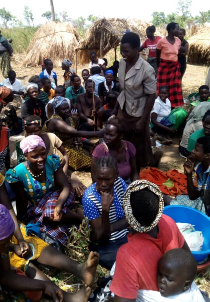 Some of the women from the Apaa community gathered together during a community meeting. © GWED-G