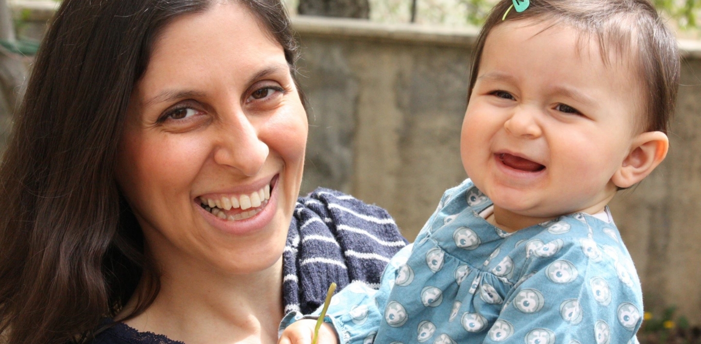Nazanin Zaghari-Ratcliffe, a British-Iranian dual-national charity worker, was arrested at Tehran’s Imam Khomeini Airport on 3 April 2016 prior to boarding a plane back to the UK after a regular family visit to the country with her infant daughter Gabriella. After being detained in solitary confinement without access to a lawyer, Zaghari-Ratcliffe was sentenced to five years in prison in September 2016 after being convicted of “membership of an illegal group” in a grossly unfair trial by a Revolutionary Court in Tehran.