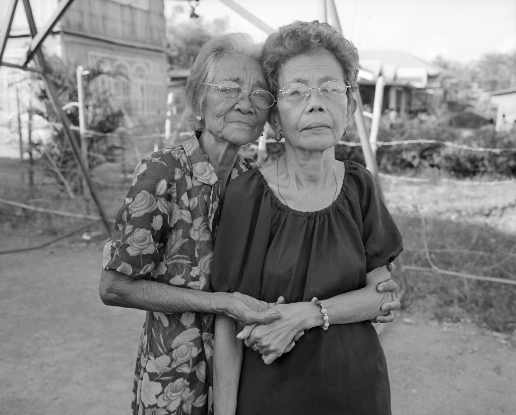 Virginia Bangit (left), 81 (in 2005), one of the Malaya Lolas (“Freedom Grandmas”) from Mapanique, the Philippines. Copyright Paula Allen.