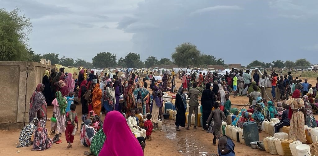 Women and children displaced from Sudan seek safety in new countries and  former hometowns