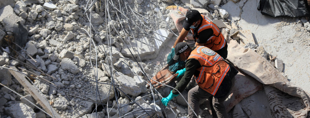 Civil defense teams and locals carry out search and rescue efforts after an Israeli attack hits Zorob family building in Rafah, Gaza on April 01, 2024.