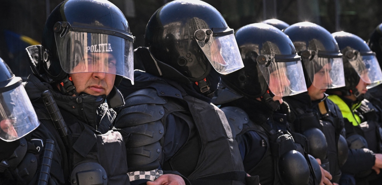 Moldovan police forces operate in riot gear during a protest organized by a Moldovan member of parliament on behalf of the "Sor" opposition party in Chisinau on March 12, 2023