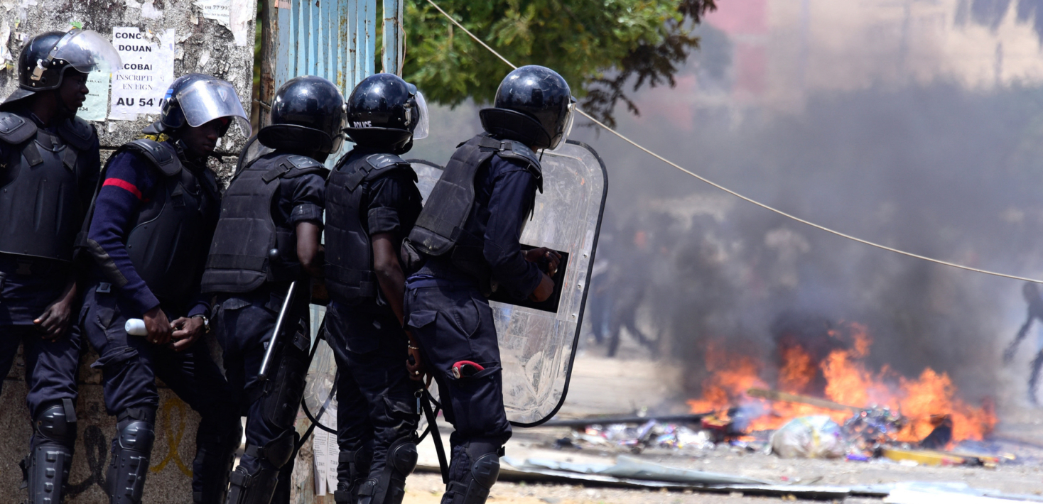 Senegalese police confront students during protests at the University Cheikh Anta Diop of Dakar on 16 May 2018 in Dakar.