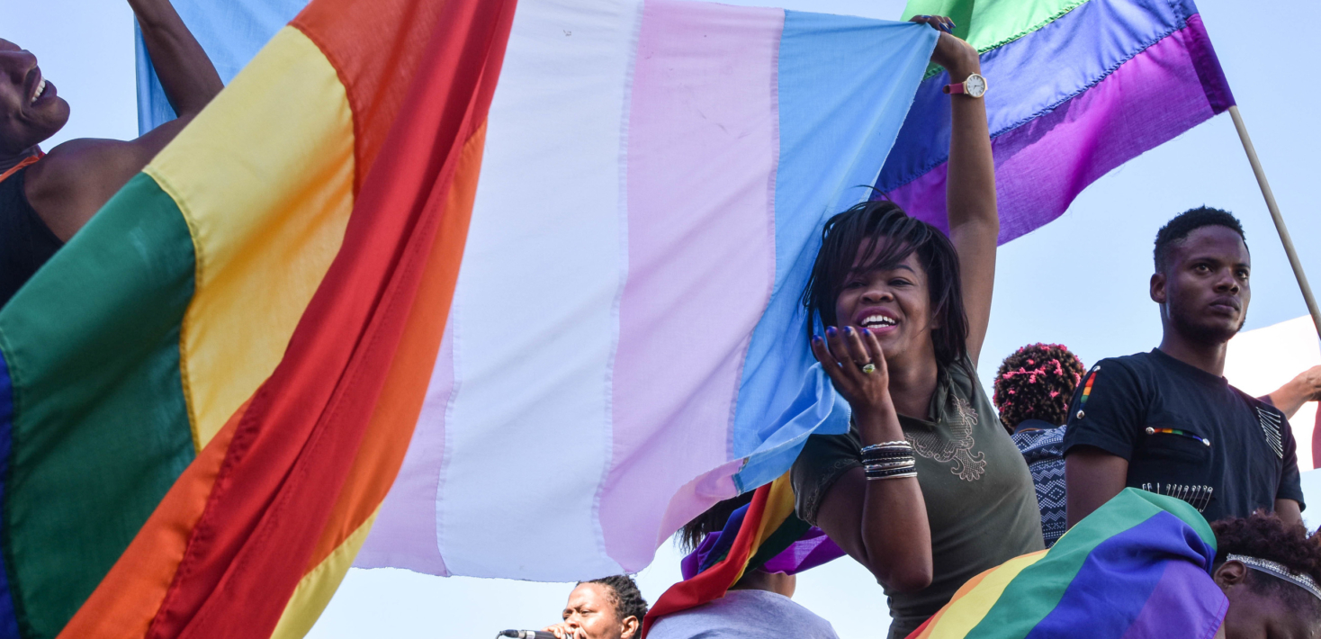 Dozens of people cheer and dance as they take part in the Namibian Lesbians, Gay, Bisexual and Transexual (LGBT) community pride Parade in the streets of the Namibian Capitol on July 29, 2017 in Windhoek.  Even though there have been marches and protests against discrimination against the LGBT community in the past years, this is the first time that the community held such a parade along the capital's main street, Independence Avenue, to celebrate their identity and rights. / AFP PHOTO / Hildegard Titus        © HILDEGARD TITUS/AFP via Getty Images