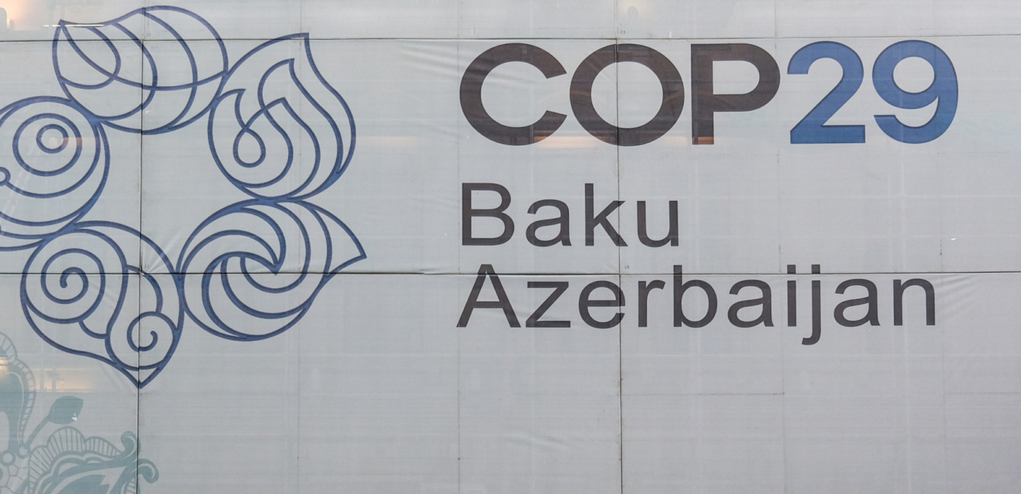 A banner on a building in Baku which says COP29, Baku, Azerbaijan