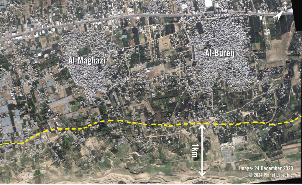 Satellite image shows two towns before parts of them were destroyed. A yellow dotted line shows the 1km mark.