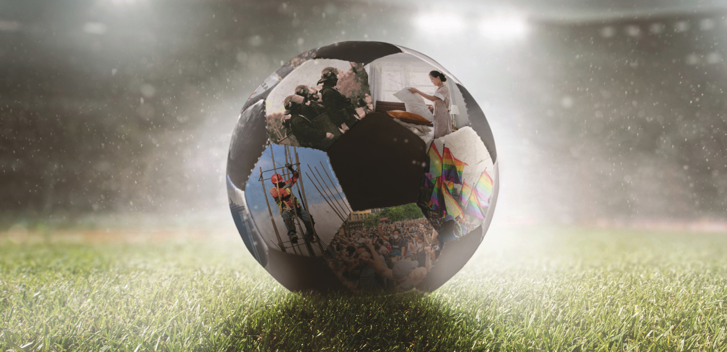 Image of stylised football on a floodlit pitch with human rights related images on the ball's panels.